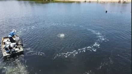 Clean-Flo boat in water