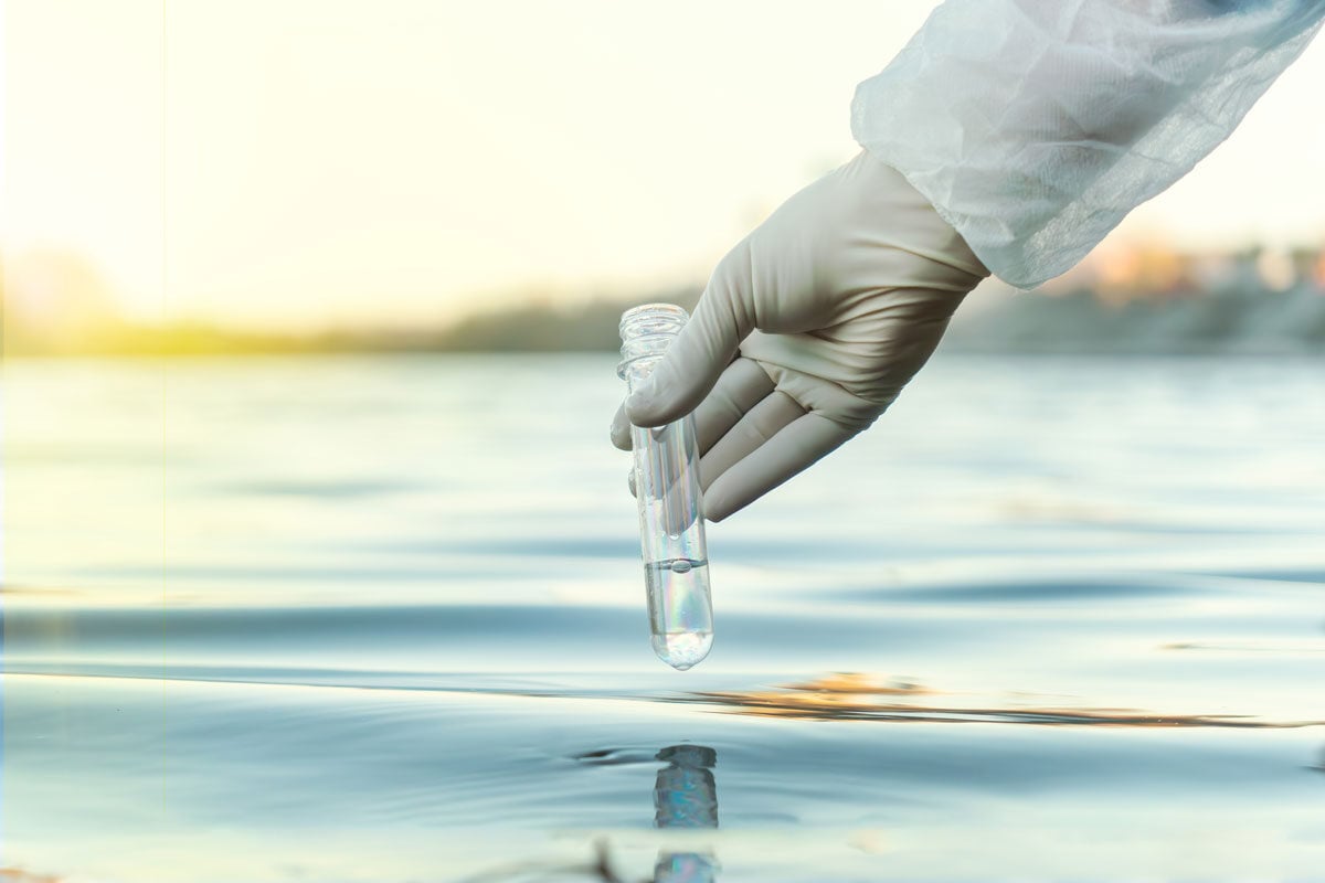 Scientist testing lake water